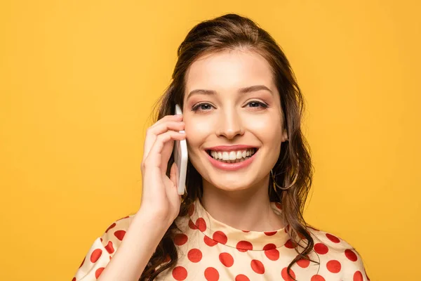 Cheerful Young Woman Smiling Camera While Talking Smartphone Isolated Yellow — Stock Photo, Image