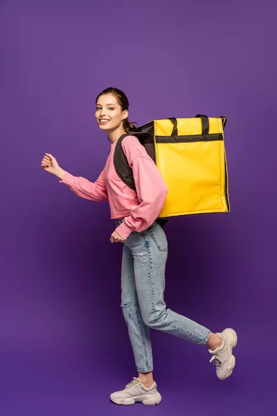 Pretty Courier Running While Carrying Thermo Box Smiling Camera Purple — 스톡 사진