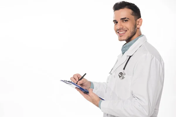 Side View Smiling Doctor Clipboard Looking Camera Isolated White — Stock Photo, Image