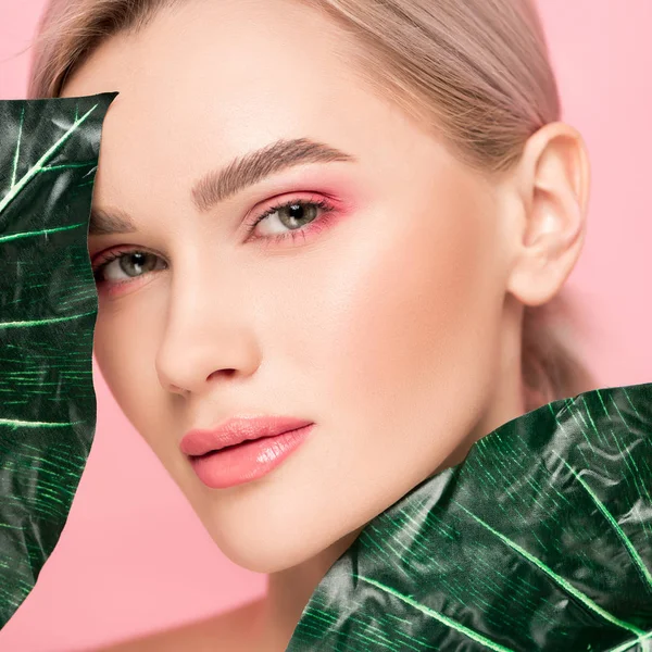 Beautiful Young Woman Pink Makeup Isolated Pink Green Leaves — 스톡 사진