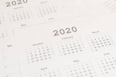 High angle view of paper calendars of 2020 year  clipart