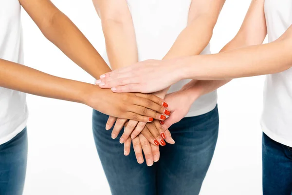 Vista Cortada Mulheres Multiculturais Colocando Mãos Juntas Isoladas Branco — Fotografia de Stock