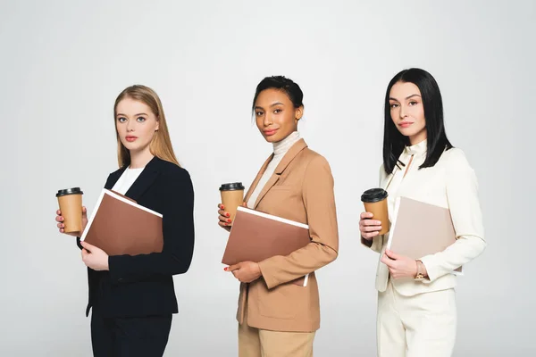 Multicultural Businesswomen Holding Disposable Cups Folders Isolated White — Stock Photo, Image