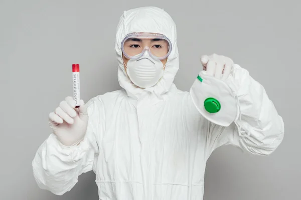 Asian Epidemiologist Hazmat Suit Holding Respirator Mask Test Tube Blood — Stock Photo, Image