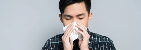 Young Asian Man Closed Eyes Wiping Nose Paper Napkin While — Stock Photo, Image