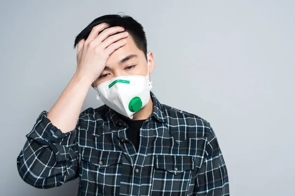 Young Asian Man Respirator Mask Touching Forehead While Suffering Headache — Free Stock Photo