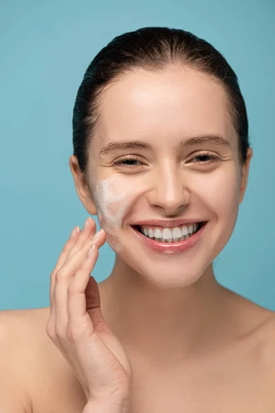 Smiling Girl Applying Cleansing Foam Face Isolated Blue — Stock Photo, Image