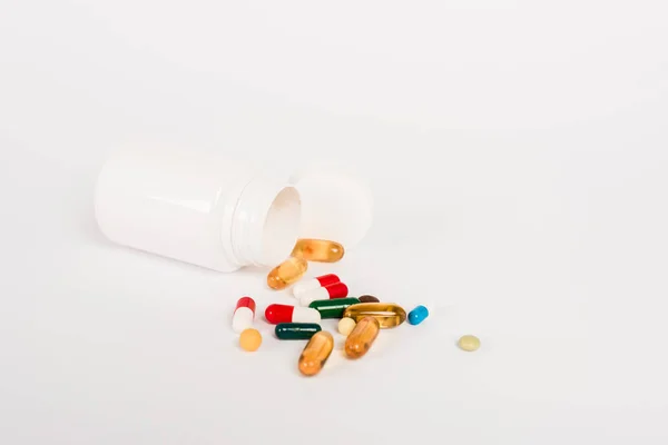 Bottle Colorful Pills White Copy Space — Stock Photo, Image