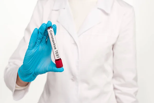 Cropped View Scientist Holding Sample Blood Coronavirus Test Lettering Isolated — Free Stock Photo