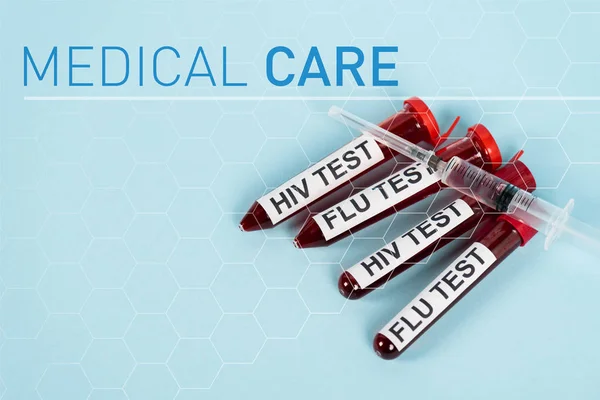 Hiv Testi Grip Testi Yapılan Şırıngaların Mavi Harflerle Yazılmış Tıbbi — Stok fotoğraf