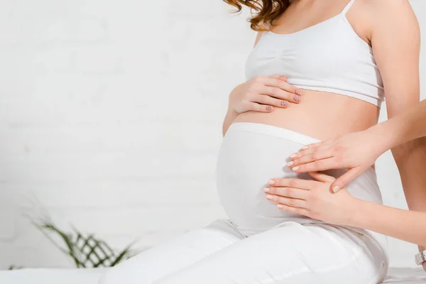 Cropped View Pregnant Woman Touching Belly Massage Spa Center — Stock Photo, Image