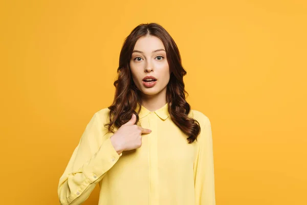 Surprised Girl Pointing Finger Herself While Looking Camera Isolated Yellow — Stock Photo, Image