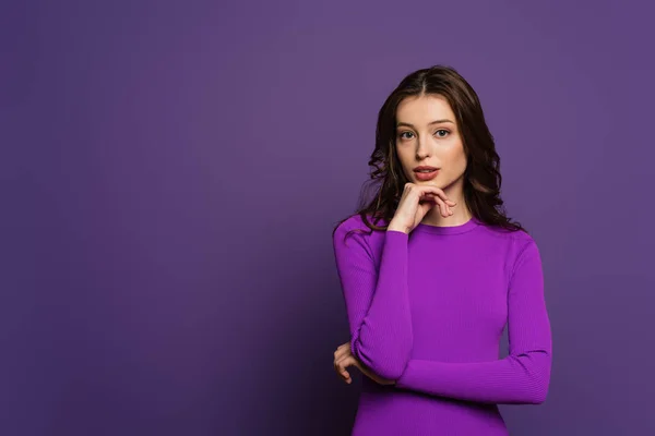Thoughtful Girl Holding Hand Chin While Looking Camera Purple Background — Stock Photo, Image