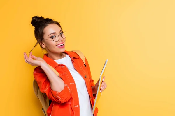 Flirty Student Touching Hair While Holding Notebook Smiling Camera Yellow — Stock Photo, Image