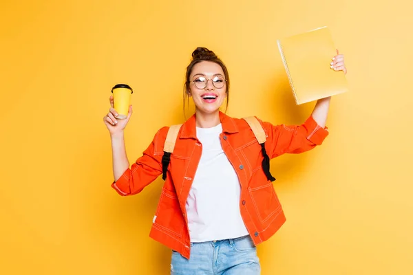 Excited Student Holding Coffee Copy Book Raised Hands While Smiling — Stock Photo, Image