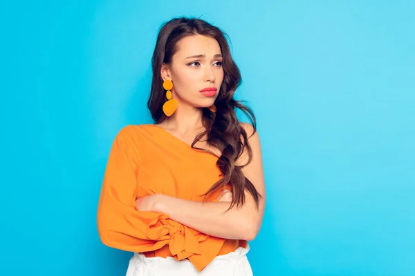 Upset Fashionable Girl Looking Away While Standing Crossed Arms Blue — Stock Photo, Image