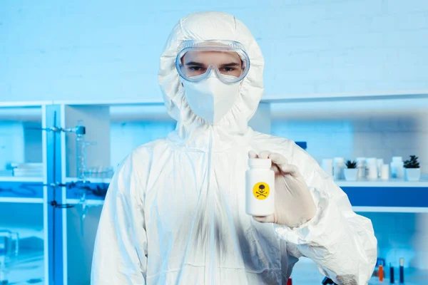 Scientist Hazmat Suit Goggles Holding Bottle Danger Sign — Stock Photo, Image