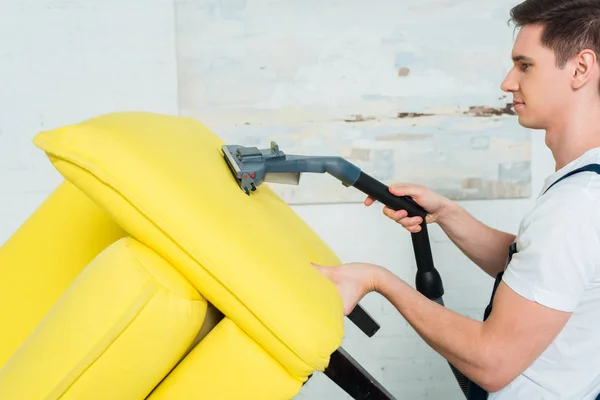 Side View Young Cleaner Dry Cleaning Modern Sofa Vacuum Cleaner — Stock Photo, Image