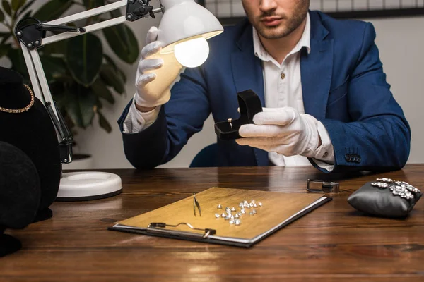 Cropped View Jewelry Appraiser Holding Ring Gemstone Box Lamp Table — Stock Photo, Image