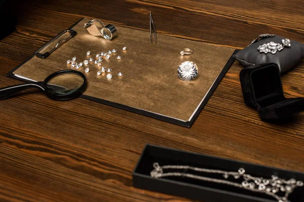Selective Focus Gemstones Jewelry Magnifying Glasses Tweezers Board Wooden Table — Stock Photo, Image