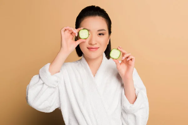 Smiling Beautiful Asian Woman Bathrobe Cucumber Slices Beige Background — Stock Photo, Image