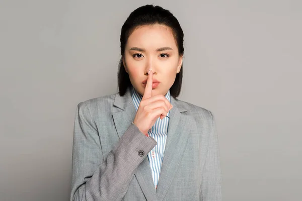 Young Businesswoman Suit Showing Shh Gesture Grey Background — Stock Photo, Image