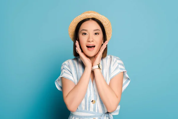 Excited Brunette Asian Girl Striped Dress Straw Hat Touching Face — Stock Photo, Image