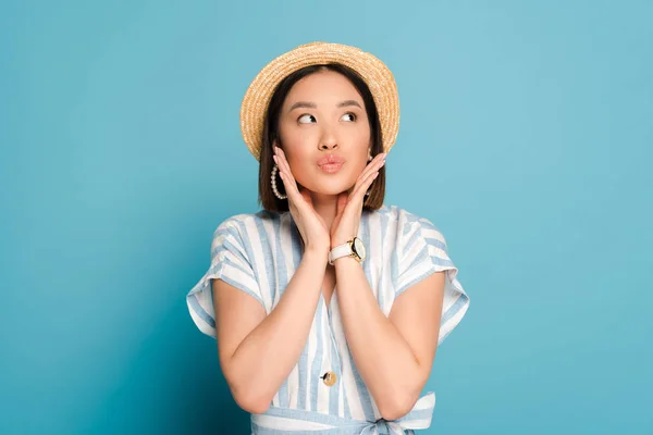 Brunette Asian Girl Striped Dress Straw Hat Touching Face Pouting — Stock Photo, Image