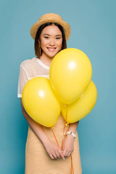 Happy Asian Girl Striped Dress Straw Hat Yellow Balloons Blue — Stock Photo, Image