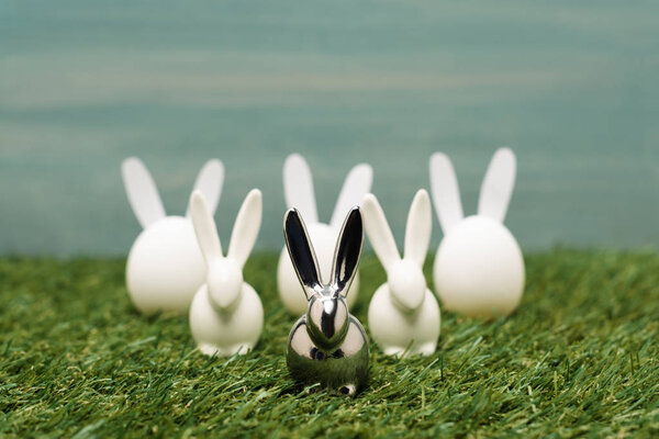 Decorative bunnies on grass, easter concept