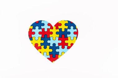 Top view of puzzle heart isolated on white, autism concept  clipart