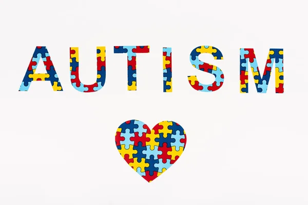 Top View Puzzle Heart Autism Lettering Isolated White — Stock Photo, Image