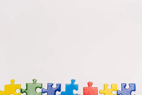 Top View Colorful Pieces Puzzle Isolated White Autism Concept — Stock Photo, Image