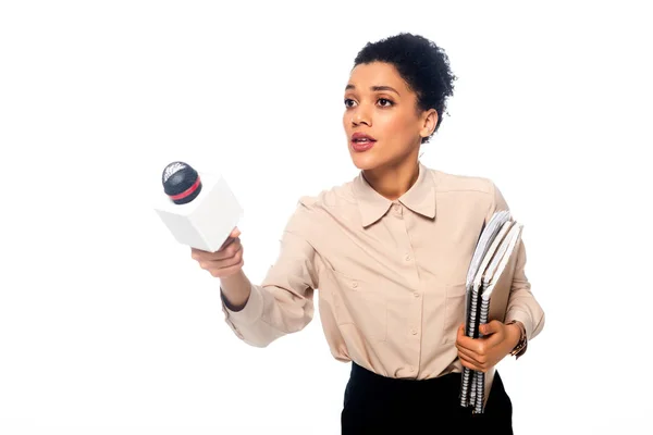 Worried African American Journalist Notebooks Microphone Outstretched Hand Isolated White — Stock Photo, Image