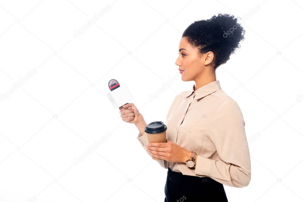 African american journalist with microphone and disposable cup of coffee isolated on white