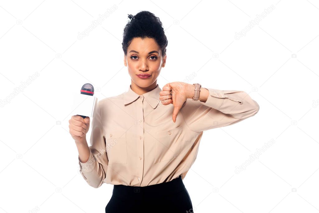 Front view of african american journalist with microphone showing dislike with thumb down isolated on white