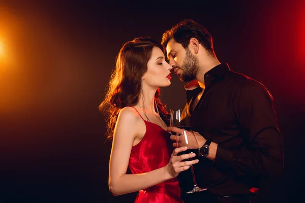 Side View Handsome Man Kissing Attractive Girlfriend Red Dress Glass — Stock Photo, Image