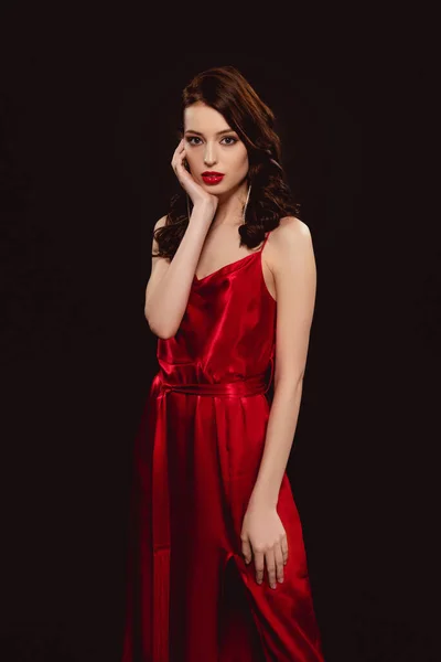 Beautiful Woman Red Dress Touching Face Looking Camera Isolated Black — Stock Photo, Image