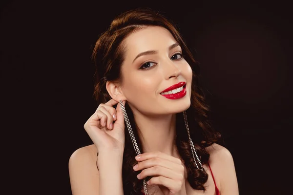 Beautiful Woman Red Lips Touching Earring Smiling Camera Isolated Black — Stock Photo, Image