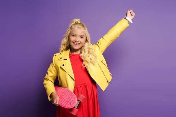 Smiling Kid Hand Air Holding Penny Board Purple Background — Stock Photo, Image