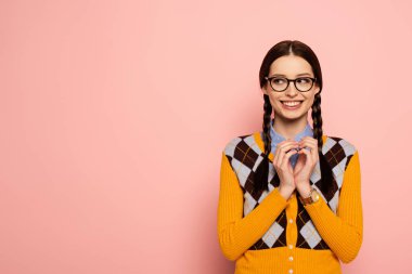 cunning female nerd in eyeglasses gesturing on pink clipart