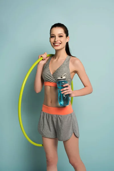 Cheerful Athletic Woman Holding Hula Hoop Sports Bottle Water Blue — Stock Photo, Image