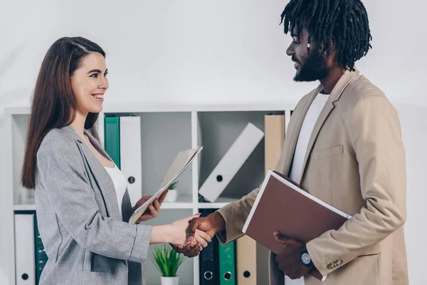 African American Employee Recruiter Documents Looking Each Other Smiling Shaking — Stock Photo, Image