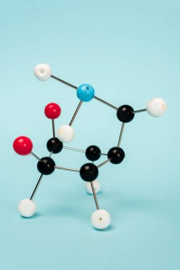 Construction of hormone molecular formula on blue background clipart