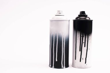 metallic graffiti paint cans isolated on white  clipart