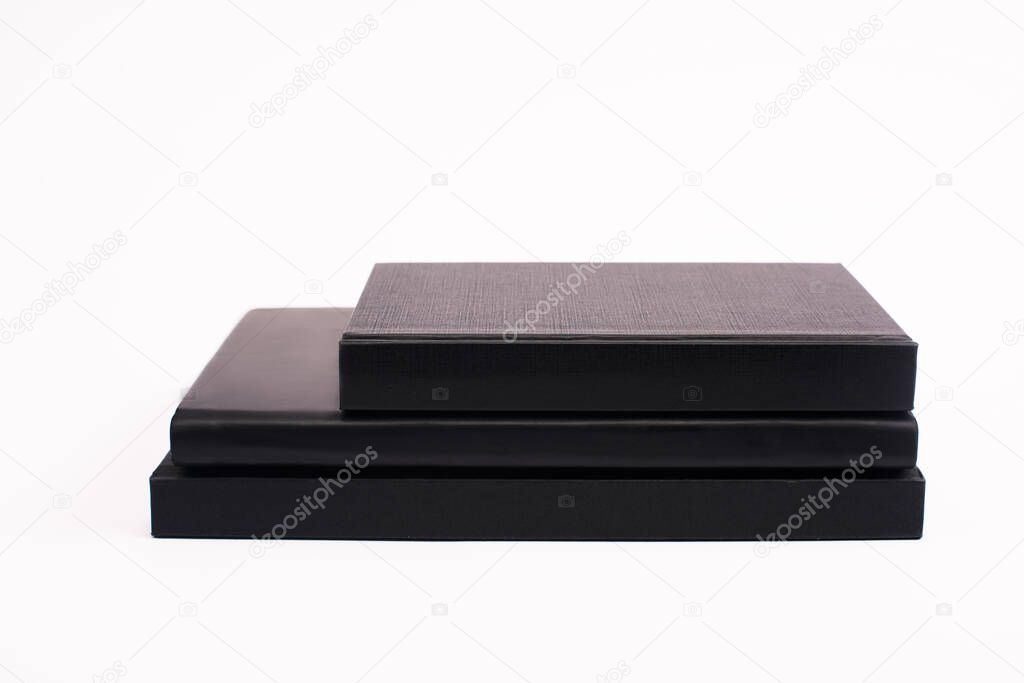 black notepads isolated on white with copy space 
