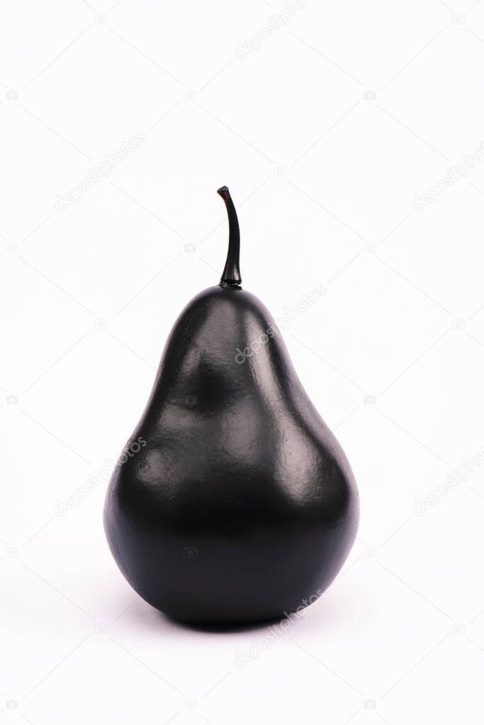 black and nutritious pear on white with copy space 