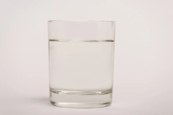 Close View Glass Water White Surface — Stock Photo, Image