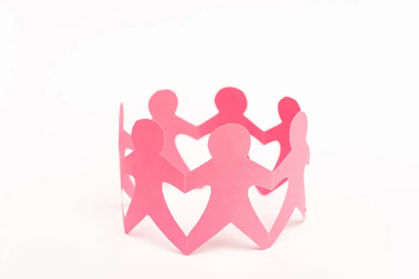 Pink Paper Figures People Holding Hands White Background — Stock Photo, Image