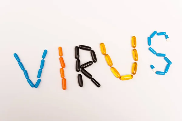 Top View Virus Lettering Pills White Background — Stock Photo, Image